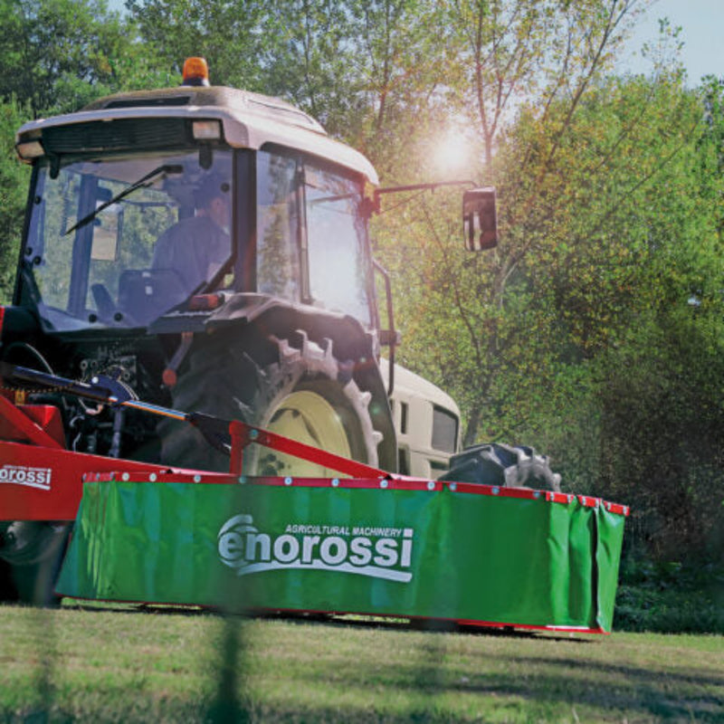Enorossi rotary drum mower BT rear-mounted on tractor cutting grass