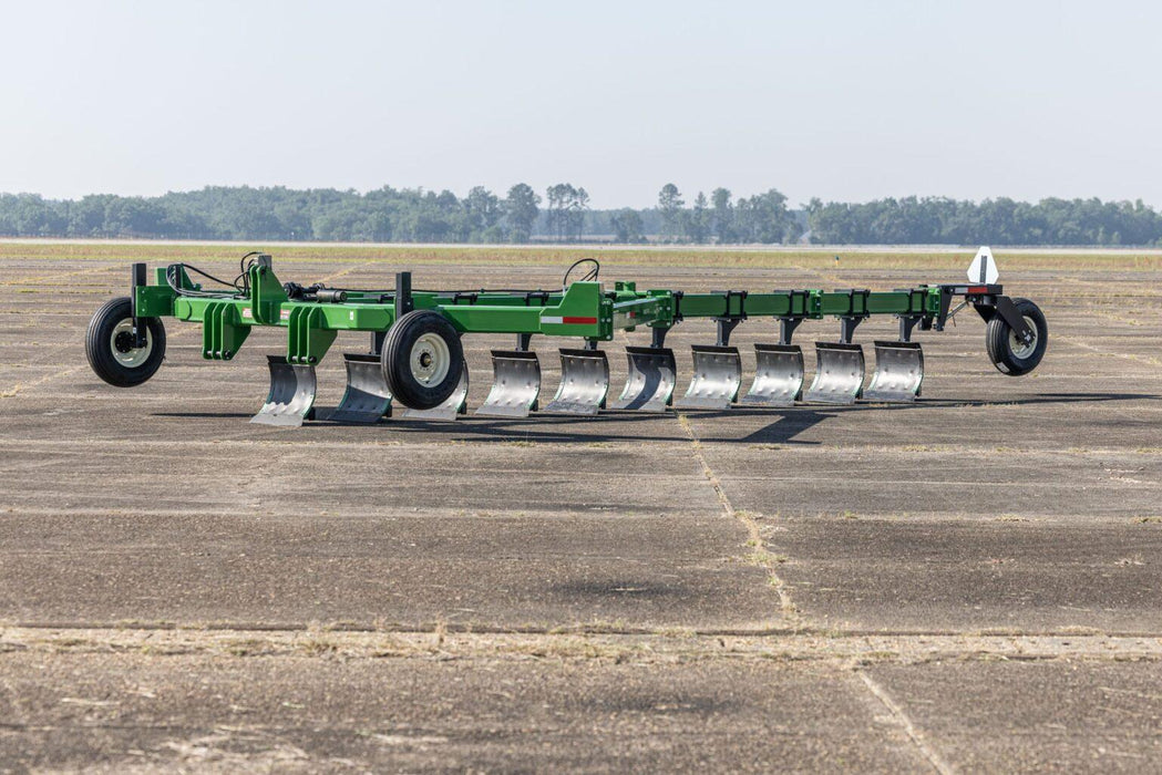 Harrell Ag on-land switch plow moving through cultivated soil