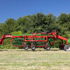 Enorossi CR-850 basket bar rake operating in grass field