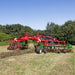 Wide field view of Enorossi CR-850 basket bar rake in operation