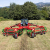 Enorossi CR-850 basket bar rake preparing forage for baling