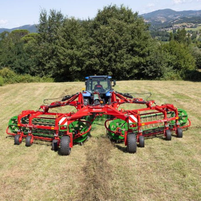 Enorossi CR-850 basket bar rake preparing forage for baling