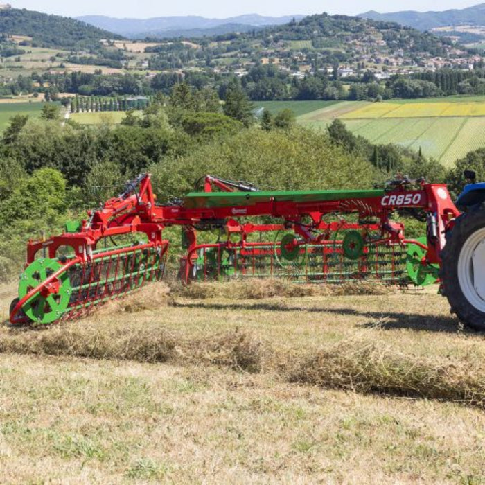 Rear angle of Enorossi CR-850 basket bar rake during raking