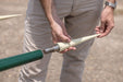 Harrell Ag cotton spear interchangeable tip being secured by hand