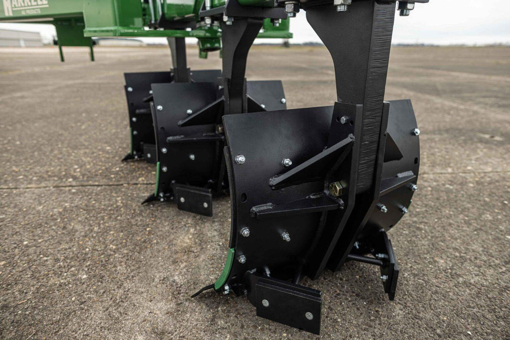 Harrell Ag In-Furrow Land Plow 9400 side view of moldboard plow bottoms and shank assemblies for tractor tillage.