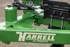 Harrell Ag In-Furrow Land Plow 9400 hydraulic cylinder and frame assembly with Harrell Ag branding for tractor tillage.