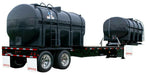 Demco 40′ Liquid Tender Trailer with dual black plastic tanks on tandem axle chassis