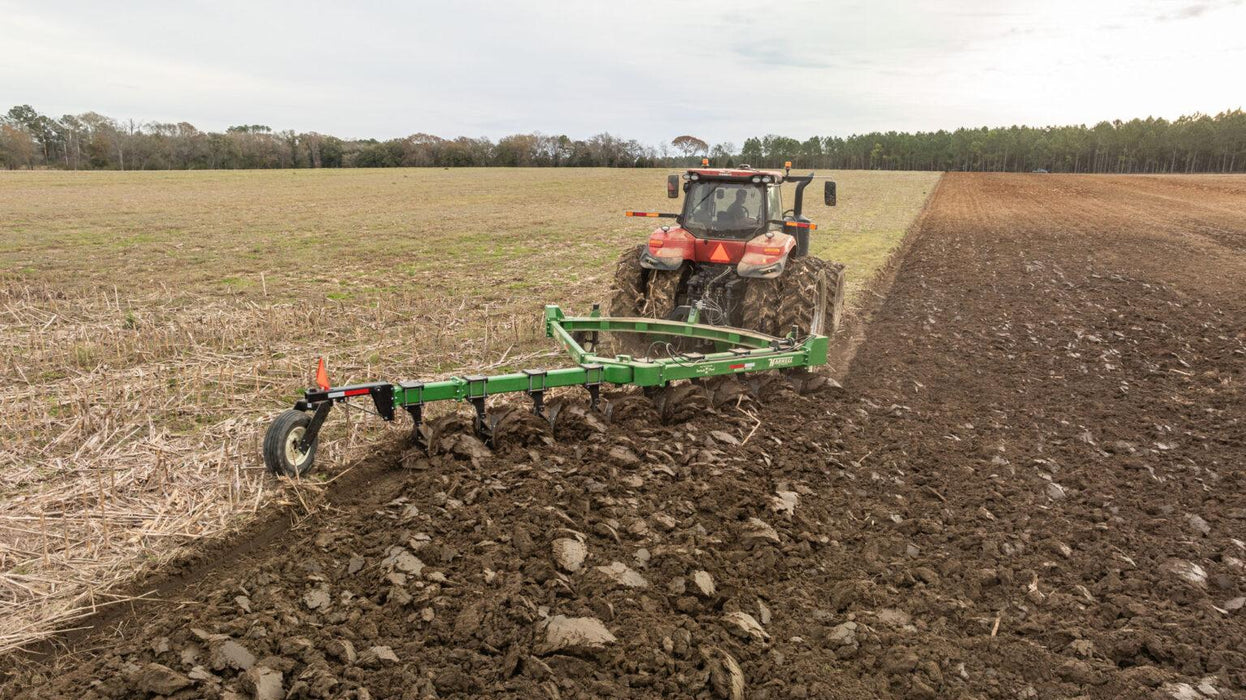 Harrell Ag On-Land Switch Plow 6508 HD plowing pass in open field