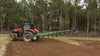 Harrell Ag On-Land Switch Plow 6508 HD attached to tractor during operation