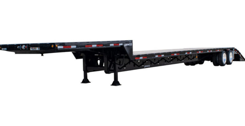 Demco tandem axle drop deck trailer with 5′ beaver tail and twin rear loading ramps