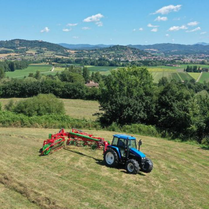 Enorossi CR-850 basket bar rake parked in field