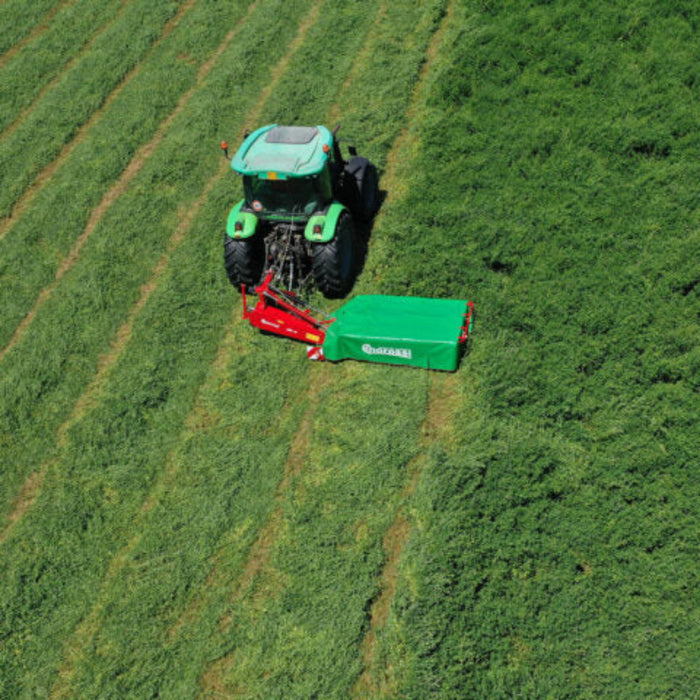 Rear-mounted Enorossi DM disc mower operating in pasture