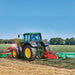 Rear view of tractor with Enorossi DM disc mower in operation