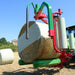 Side angle of Enorossi BW bale wrapper during silage wrapping