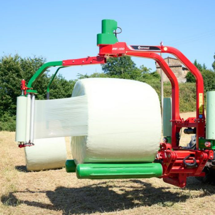 Enorossi BW mounted bale wrapper parked with wrapped silage bale
