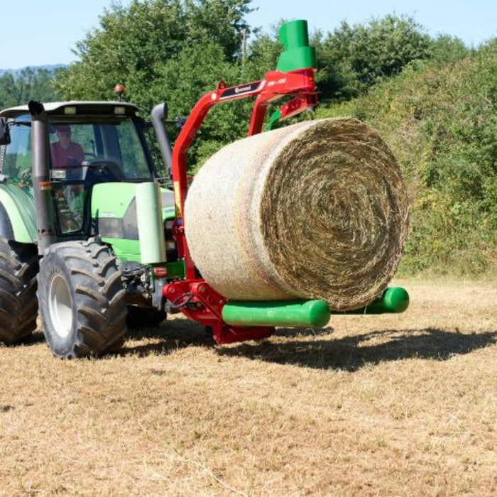 Enorossi BW 100 EVO mounted bale wrapper wrapping round bale in field