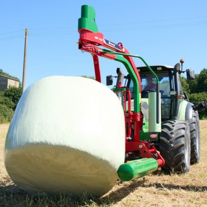 Enorossi BW bale wrapper working with tractor on uneven terrain