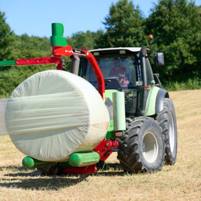 Enorossi BW mounted bale wrapper wrapping white silage bale