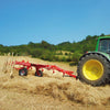 Rear view of Enorossi BATRAKE wheel rake collecting forage