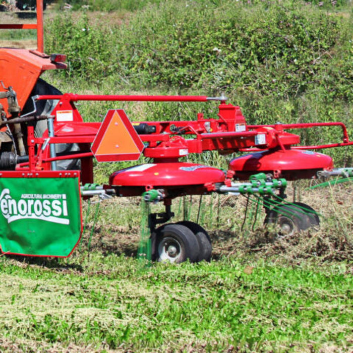 Enorossi DR 420 two-rotor tedder rake operating in hay field