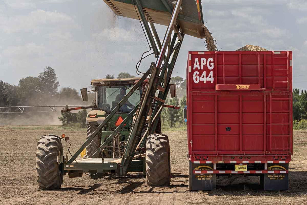 Harrell Ag Drying Van being lifted with equipment during placement