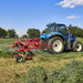 Enorossi ENODUO double rotor rake gathering forage into central windrow