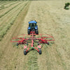 Enorossi ENODUO 780 double rotary hay rake forming central windrow in field