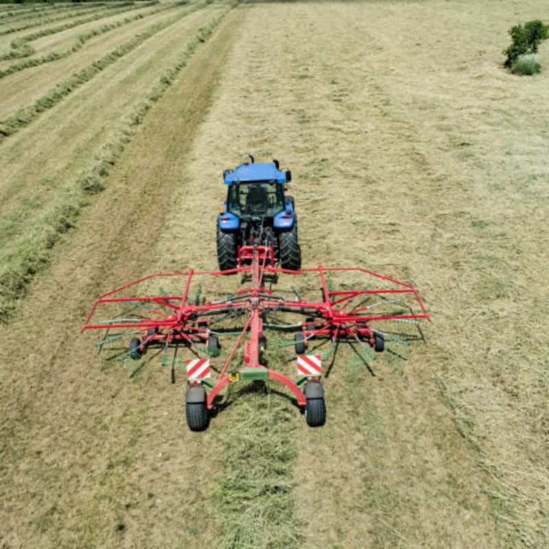Enorossi ENODUO 780 double rotary hay rake forming central windrow in field