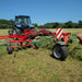 Enorossi ENODUO 780 double rotary hay rake operating behind tractor