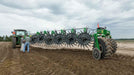 Harrell Ag Rock-N-Root Rake operating along prepared field