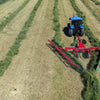 Enorossi MAXIMUS wheel rake attached to tractor in field