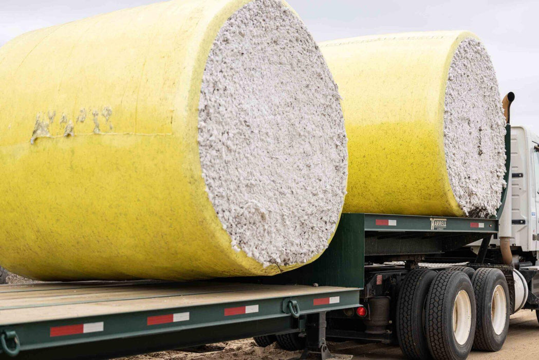 Harrell Ag Module 8 Express cotton module trailer carrying two round cotton modules