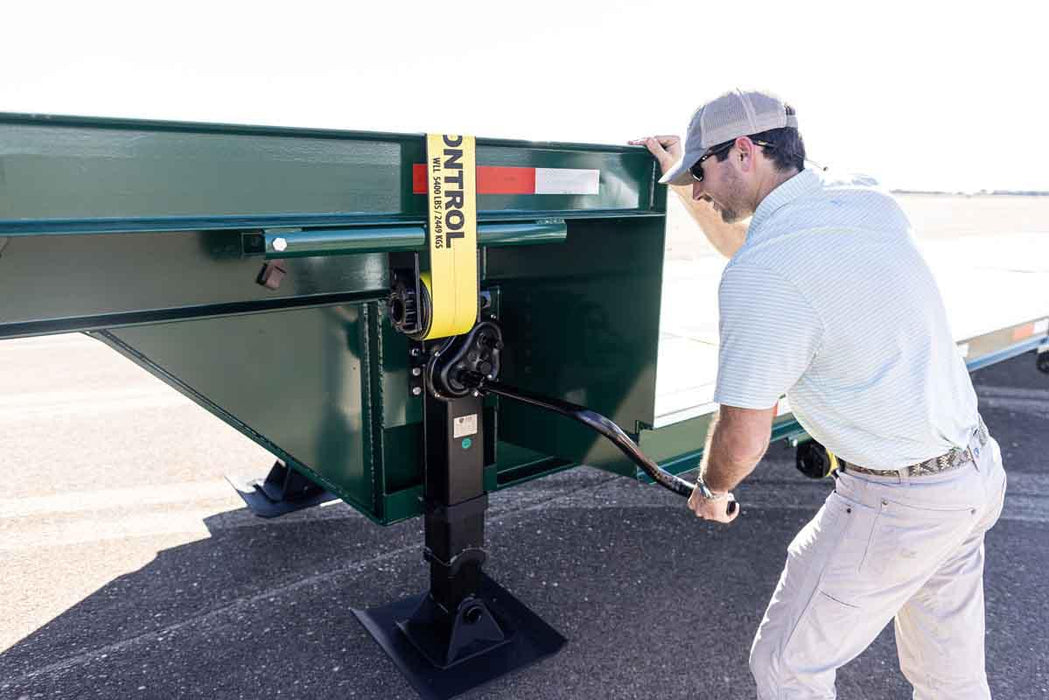 Harrell Ag Module 8 Express cotton module trailer landing stand being adjusted with hand crank
