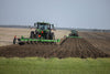 Harrell Ag 6710 HD plow completing primary tillage across field