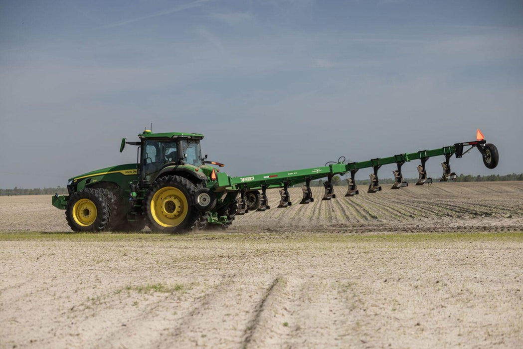 Harrell Ag on-land switch plow working in open agricultural land