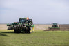 Harrell Ag on-land switch plow viewed from rear during tillage pass