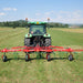 Enorossi VORTEX G4 hay tedder operating behind tractor in field