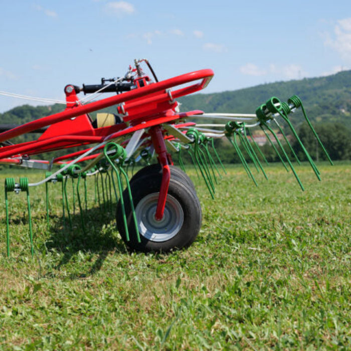 Enorossi VORTEX G4 hay tedder in transport position with folded rotors