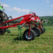 Enorossi VORTEX G4 trailed hay tedder configuration in grass field