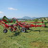 Side transport view of Enorossi VORTEX G6-740 PROFILINE hay tedder with chassis