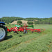 Enorossi VORTEX G6-740 PROFILINE hay tedder operating on uneven grass terrain