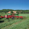 Wide field view of Enorossi VORTEX G6-740 PROFILINE hay tedder spreading forage