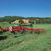Wide field view of Enorossi VORTEX G6-740 PROFILINE hay tedder spreading forage