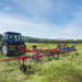 Side view of Enorossi VORTEX G6-740 PROFILINE rotary hay tedder during operation
