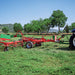 Enorossi VORTEX G6-740 PROFILINE hay tedder in transport position on field